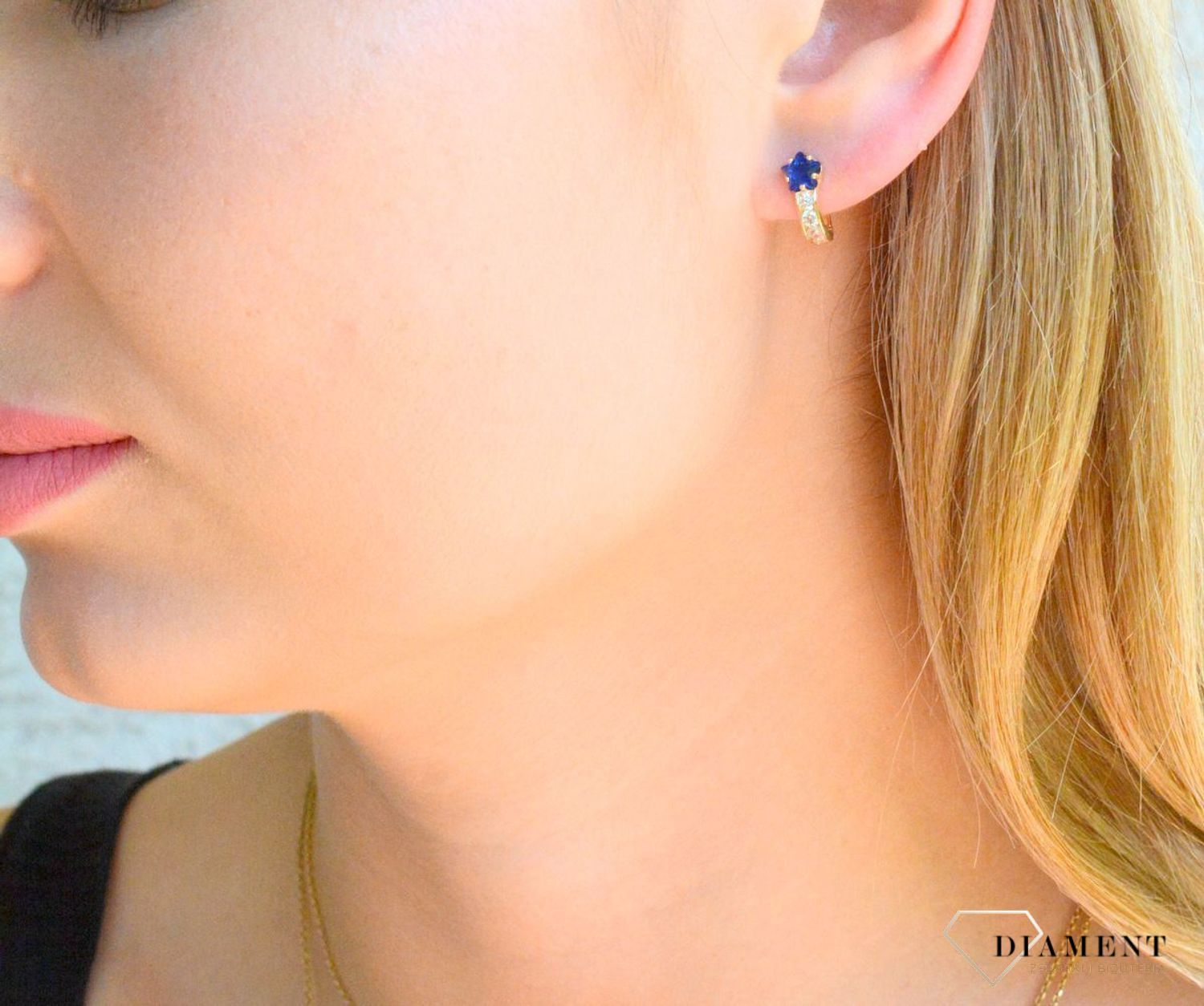 Złote kolczyki dla dziewczynki 585 ozdobione granatową cyrkonią Gwiazdki KL 500.jpg